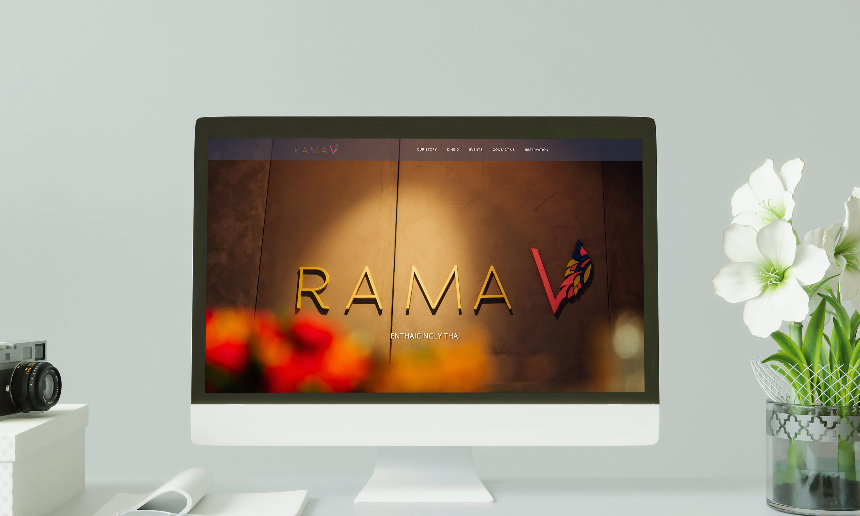 Smart mockup of computer monitor displaying Rama V's website