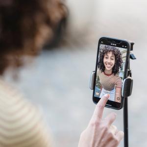 a woman recording herself via front camera